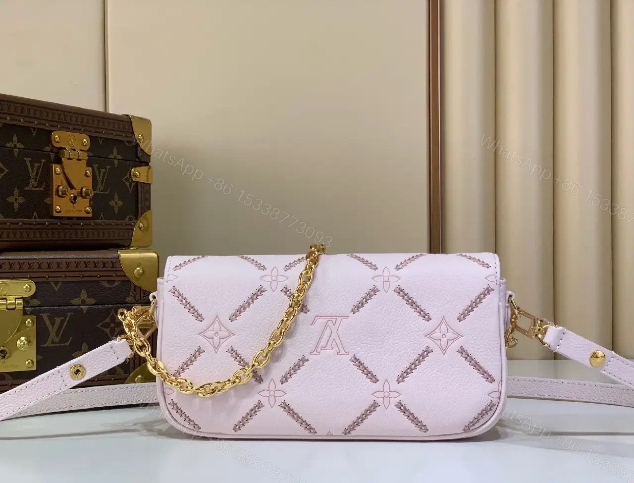 View 6 of Light Pink Pebbled Leather Shoulder Bag with LV Monogram Pattern