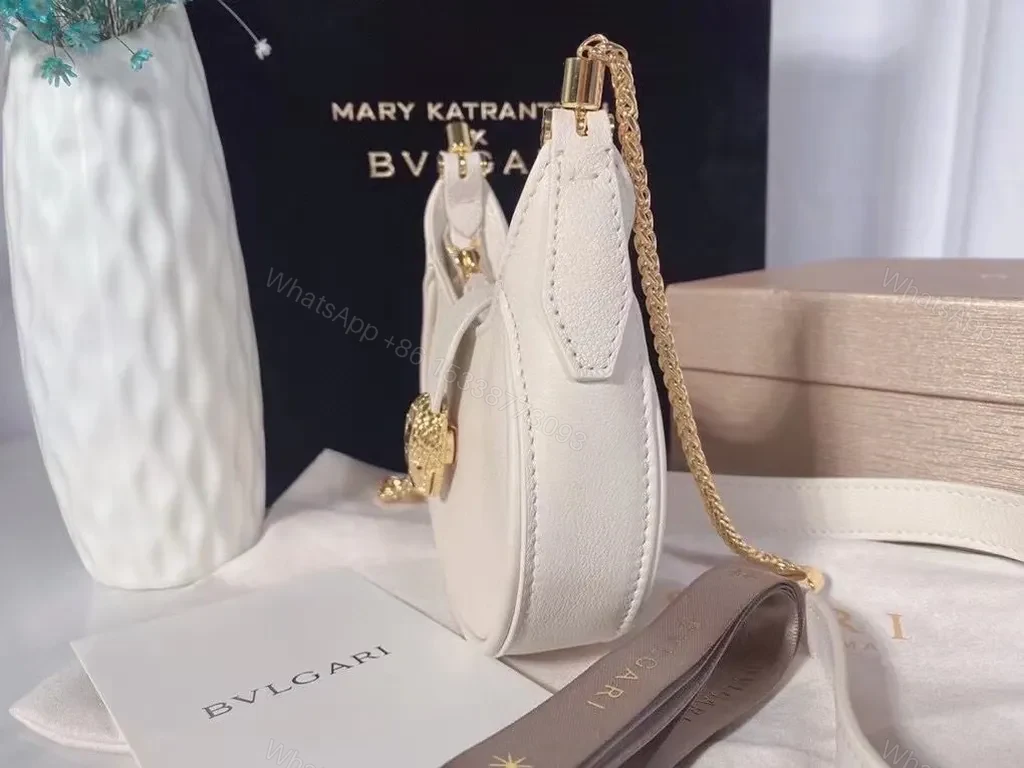 View 3 of Ivory Crescent Mini Bag â€” Day-to-Night Luxury, Sculpted Leather Bag