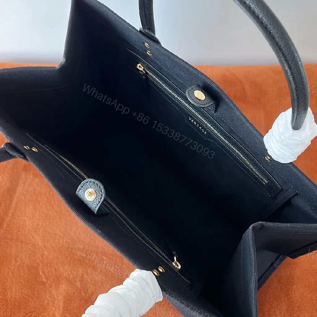View 3 of Structured Sophistication Tote: Black, Matte Shell, Modern Luxury, Gold Hardware