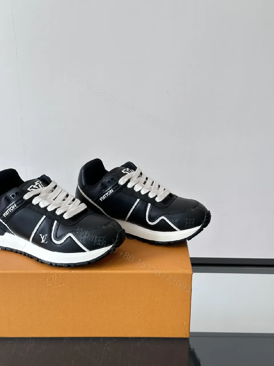 View 6 of Monochrome Luxe High-Top Sneaker with Premium Leather Comfort
