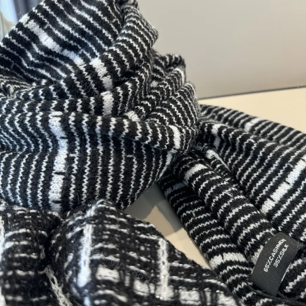 View 3 of Monochrome Knit Scarf-Wrap: Luxe Logo Detail, Grid Pattern