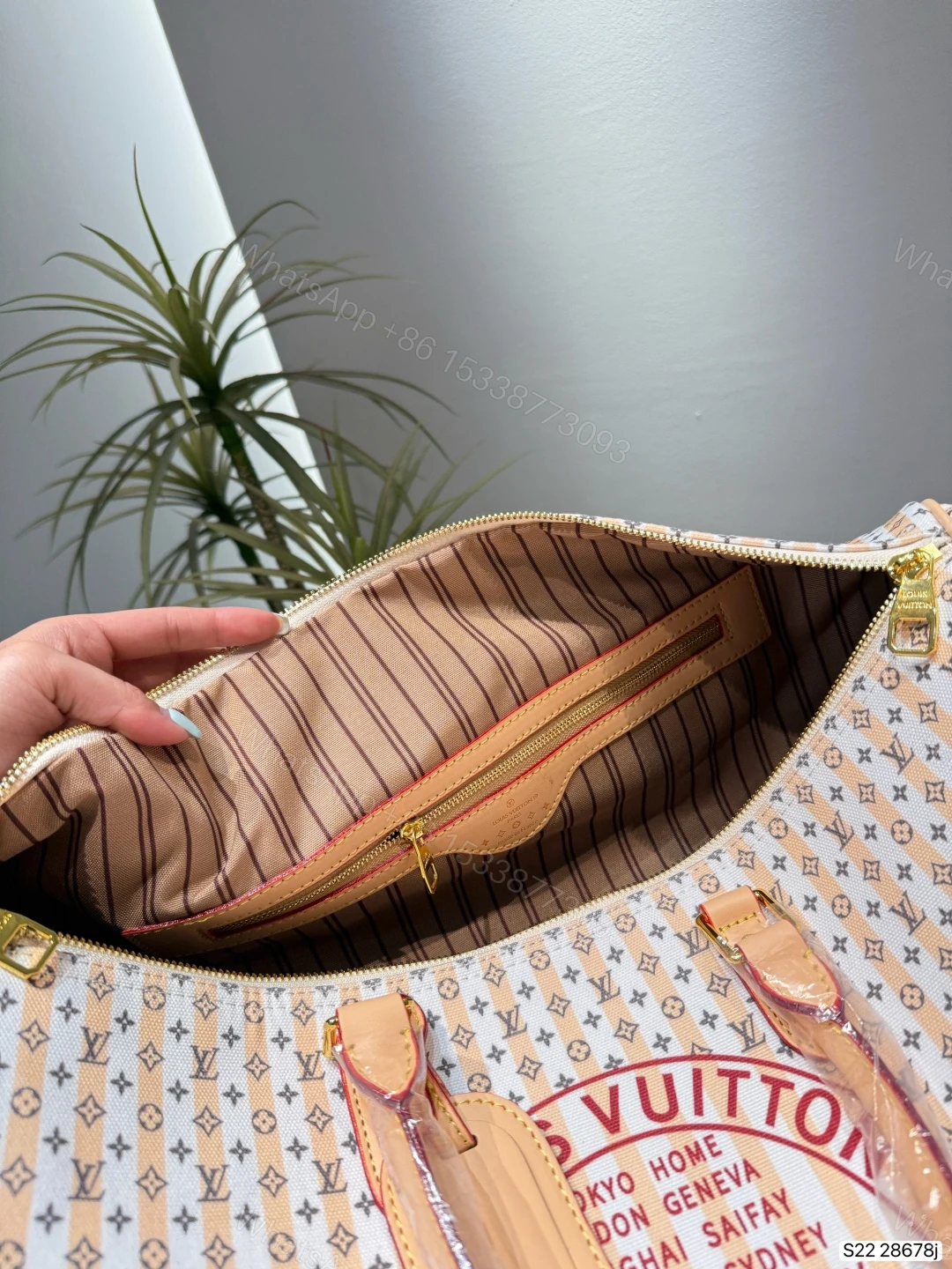 View 2 of Louis Vuitton LV Keepall Bandoulière 45 Rose