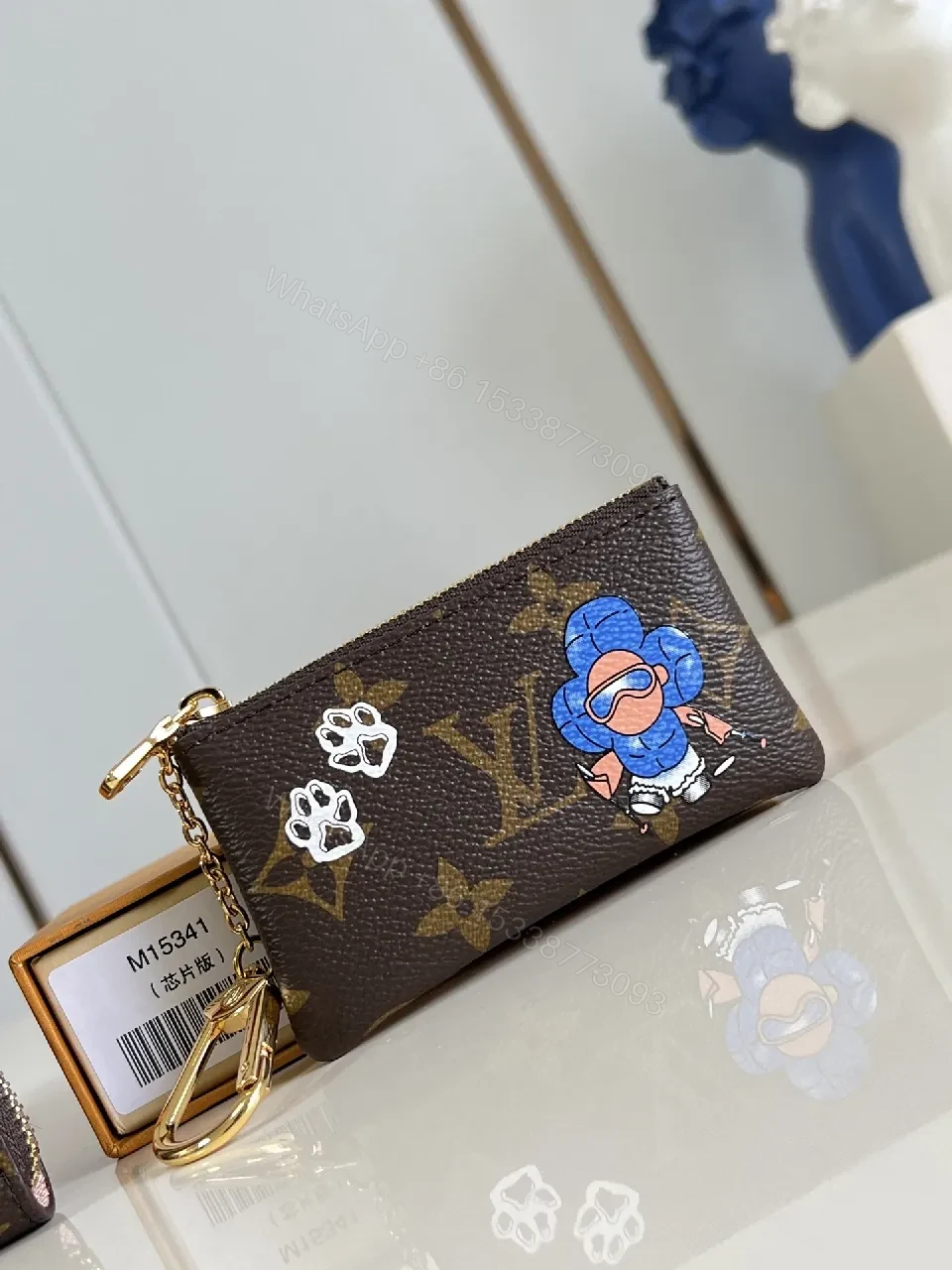 Colorful Monogram Card Wallet: Compact Luxury with Playful Art — view 1