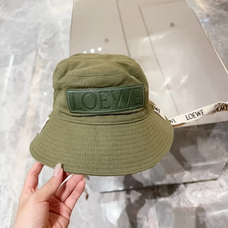 View 2 of Olive Canvas Bucket Hat: Subtle Luxury, LOEWE Patch