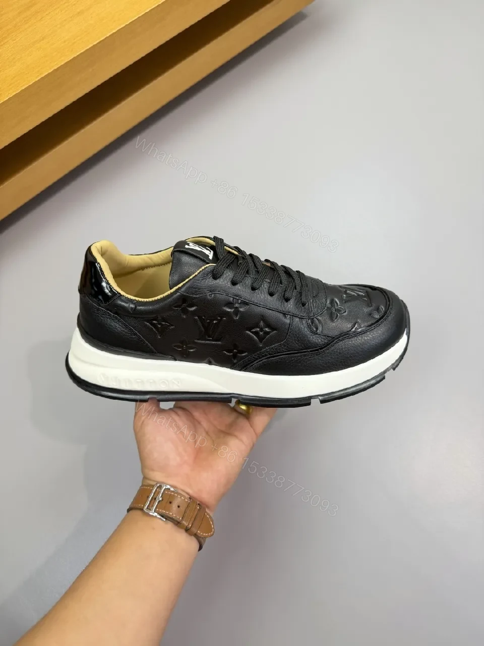 View 8 of Black Leather Trainer with Subtle Monogram Detailing - Everyday Luxe Comfort