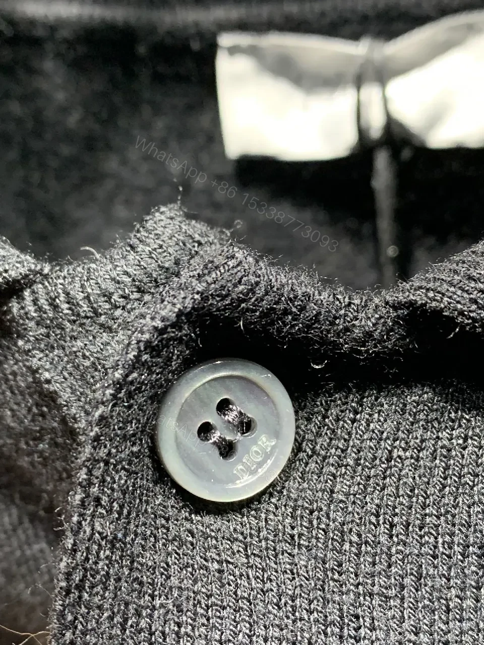 View 8 of Dark Knit Polo: Subtle Monogram Detail, Elevated Everyday Wear