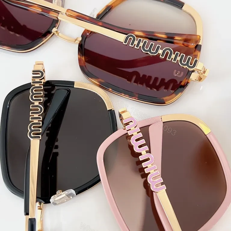 View 7 of Lux Black & Gold Rim Sunglasses with Miu Miu Hardware