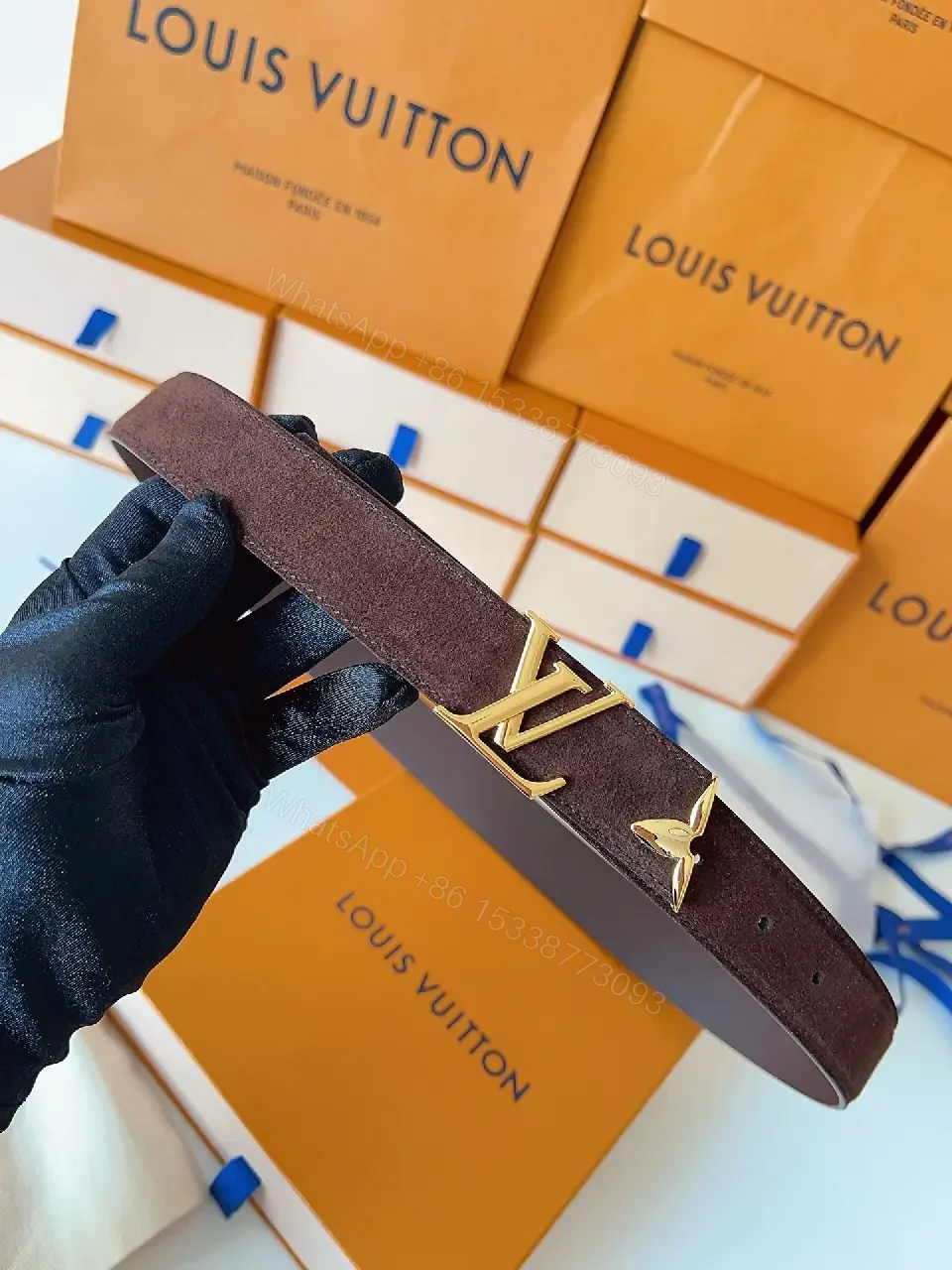 View 9 of Textured Leather Belt with Gold LV Buckle - Luxury Accessory Belt