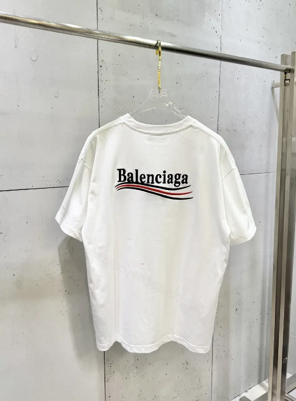 View 4 of Minimalist White Tee: Subtle Logo, Premium Cotton Short Sleeve Tee