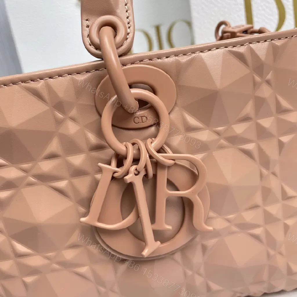 View 3 of Textured Pink Quilted Mini Bag: Elegant Everyday Luxury