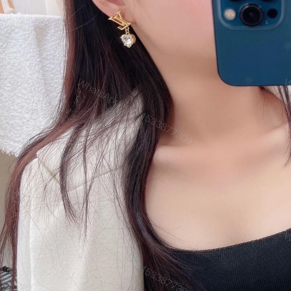 View 4 of LOUIS VUITTON ICONIC HEART EARRINGS GOLD M02385