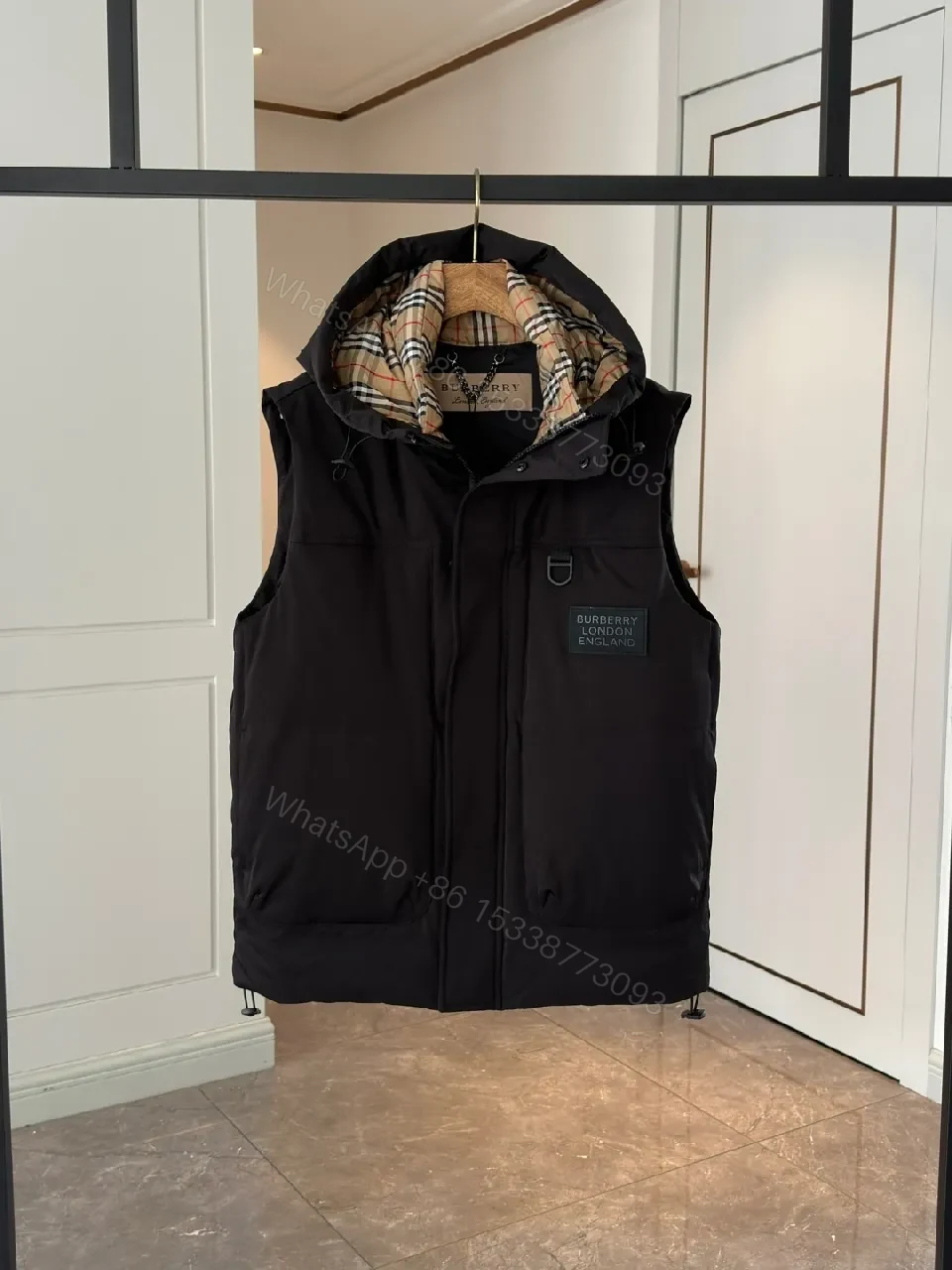 View 9 of Bold Puffer Vest with Plaid Lining — Structured Warmth, Modern Utility