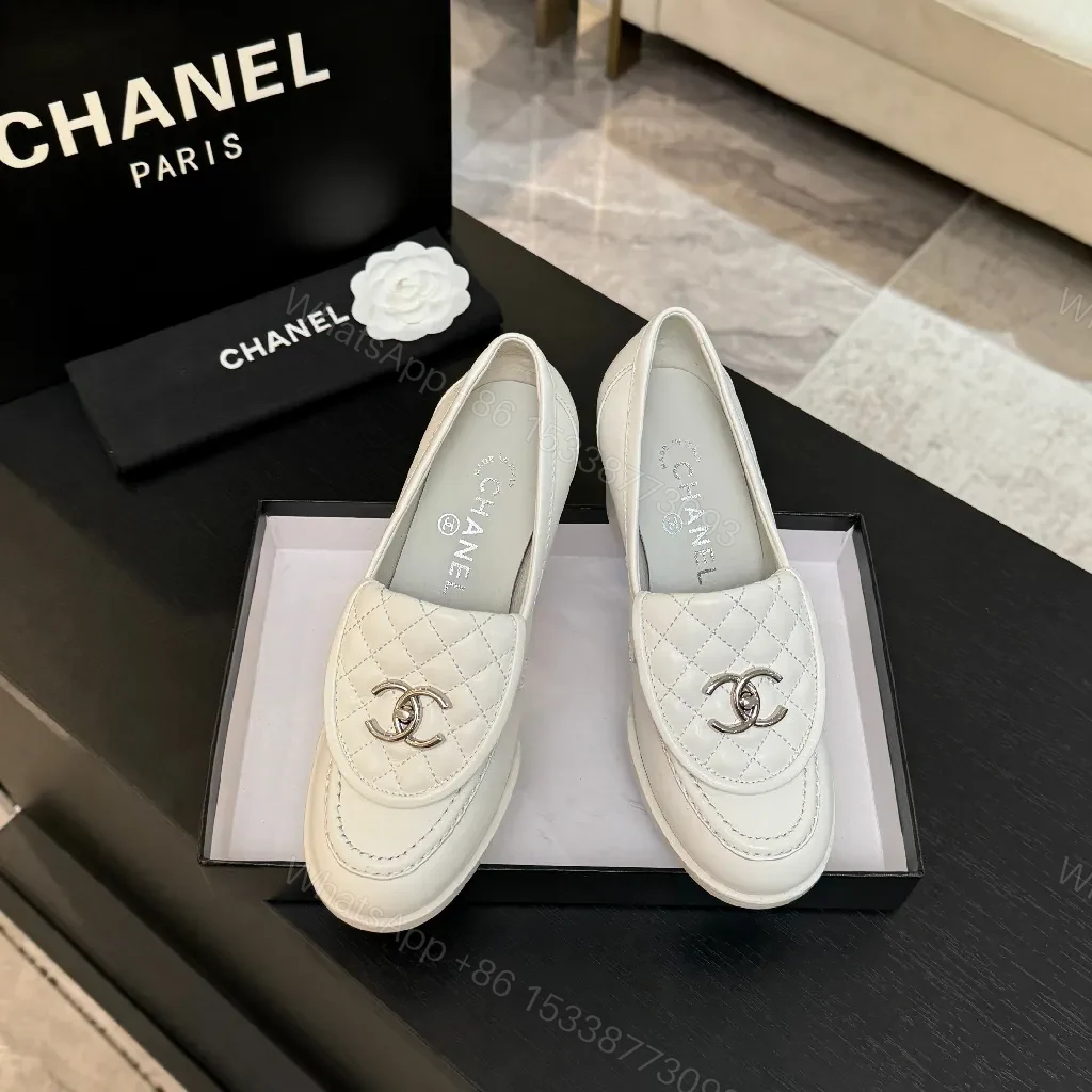 View 9 of Cream Leather Quilted Loafers with Signature Detail - Slip-On Style