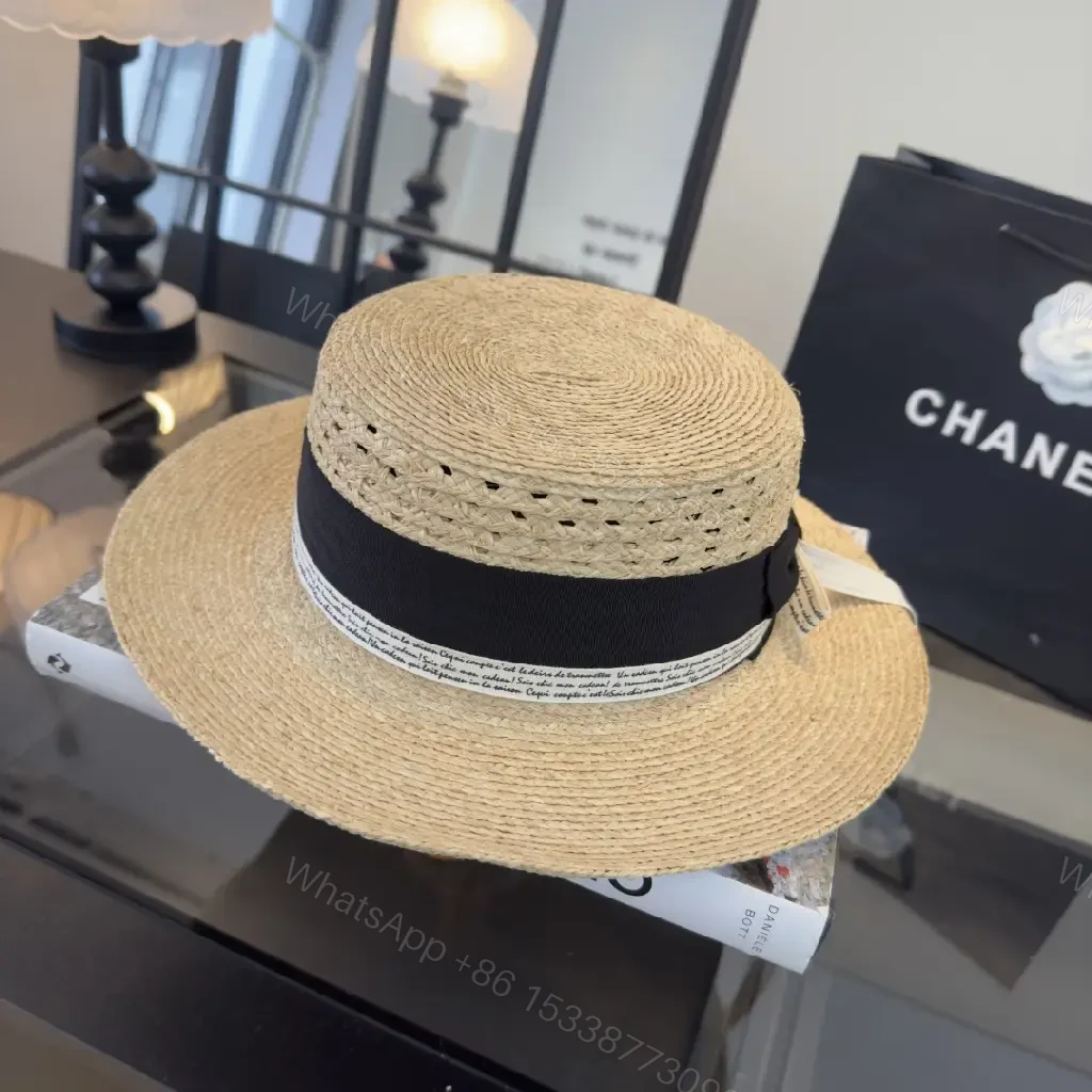 View 10 of Natural Straw Fedora Hat with Bow Ribbon Detail - Chanel Logo