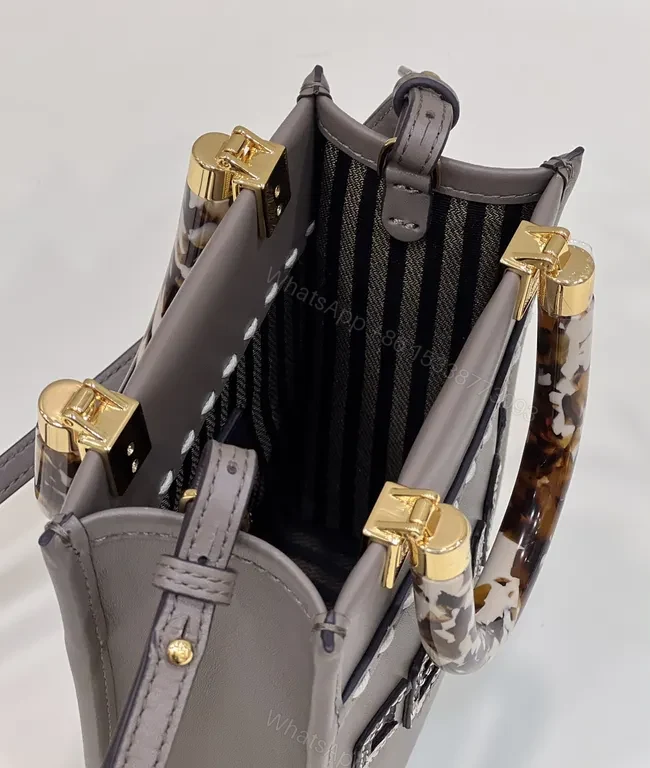 View 4 of Structured Mini Bag: Sculpted Logo, Tortho Handle, Gold Accents
