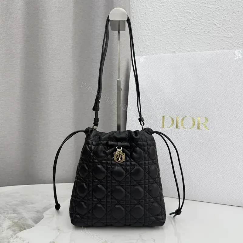 Quilted Black Drawstring Bucket Bag with Gold Hardware — view 1