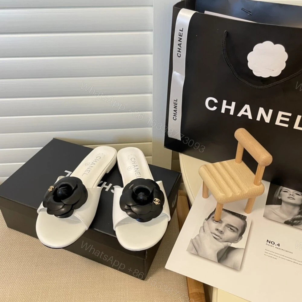 View 2 of Chanel Black Camellia Slides White