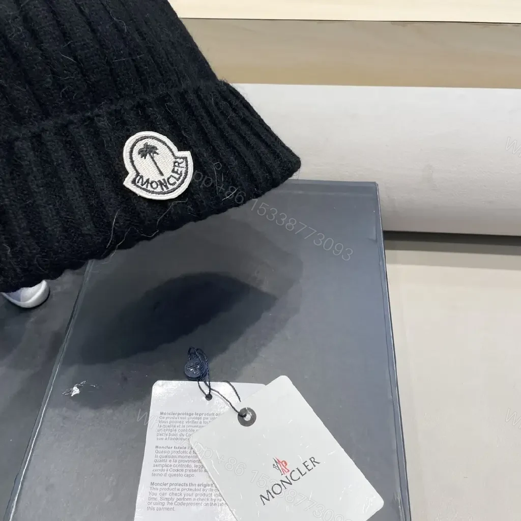 View 8 of Cozy Black Knit Beanie with Signature Patch, Luxury Style