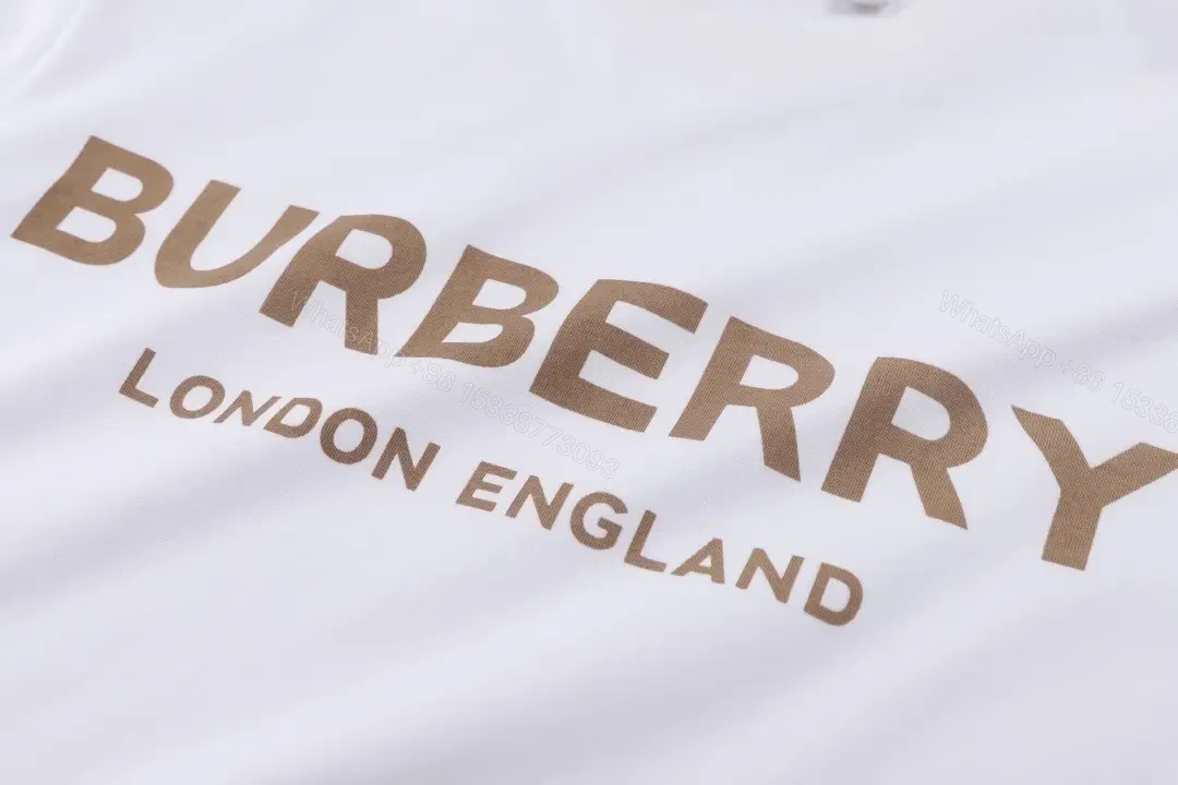 View 4 of Gold Logo White Tee — Minimalist Luxe Streetwear Tee