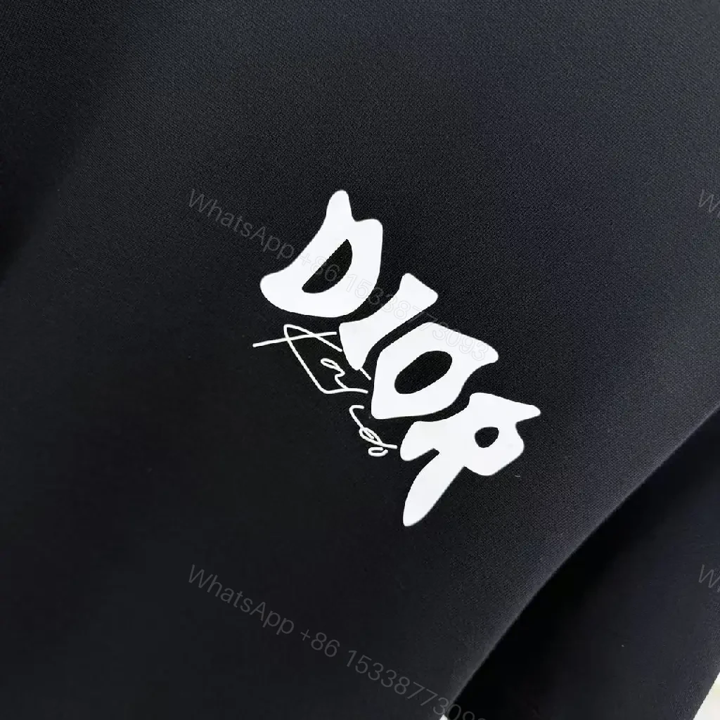 View 4 of Black Cotton Tee: Minimalist Graphic, Designer-Inspired Logo, Unisex Short Sleeve T-Shirt