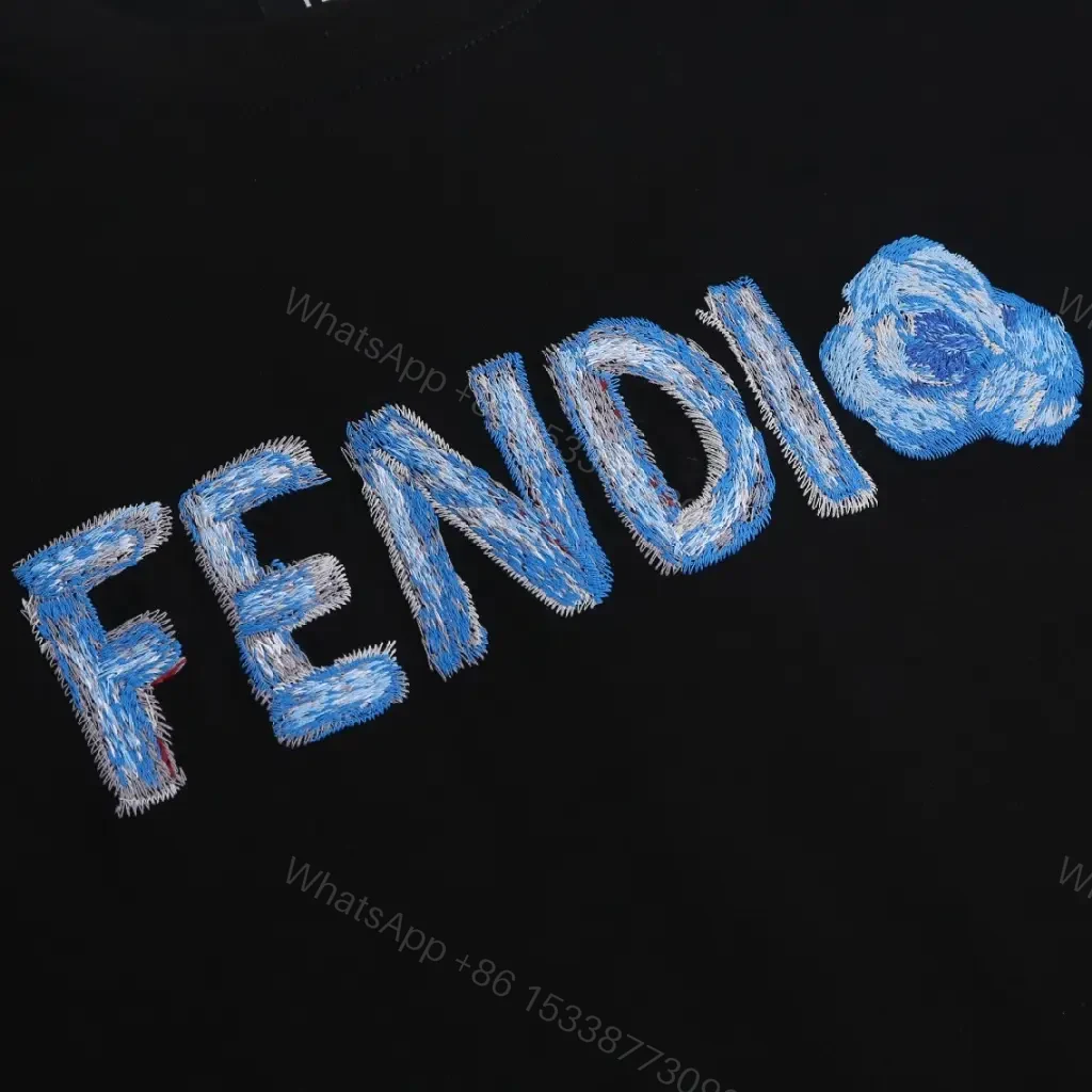 View 9 of Ice-Blue Fendi Logo Tee – Luxury Comfort, Black Cotton
