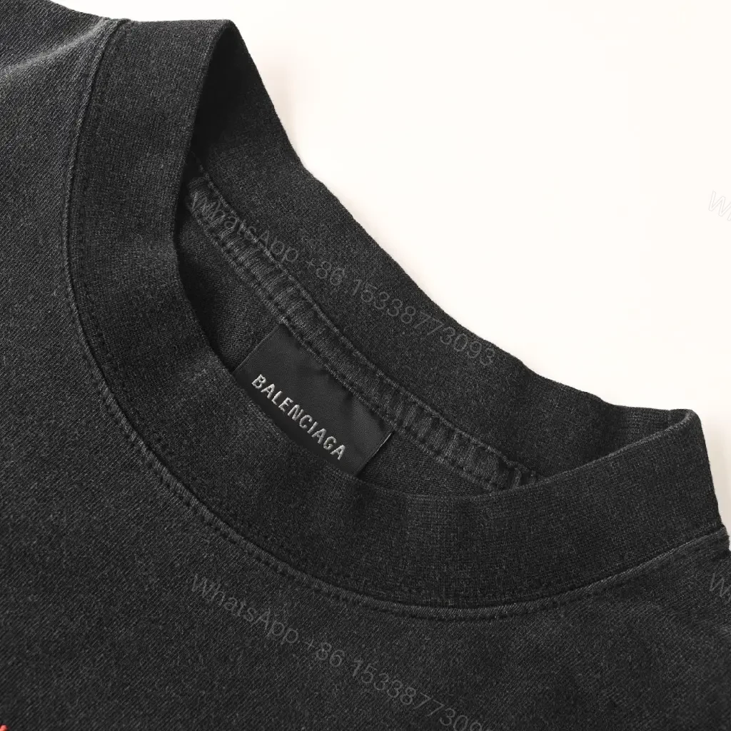 View 7 of Minimalist Black Cotton Tee with Subtle Red Embroidery