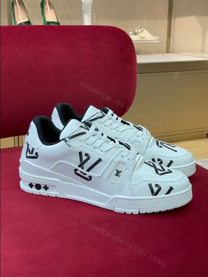 View 2 of LOUIS VUITTON TRAINER LOW-TOP SNEAKERS IN WHITE AND BLACK – LSVT389