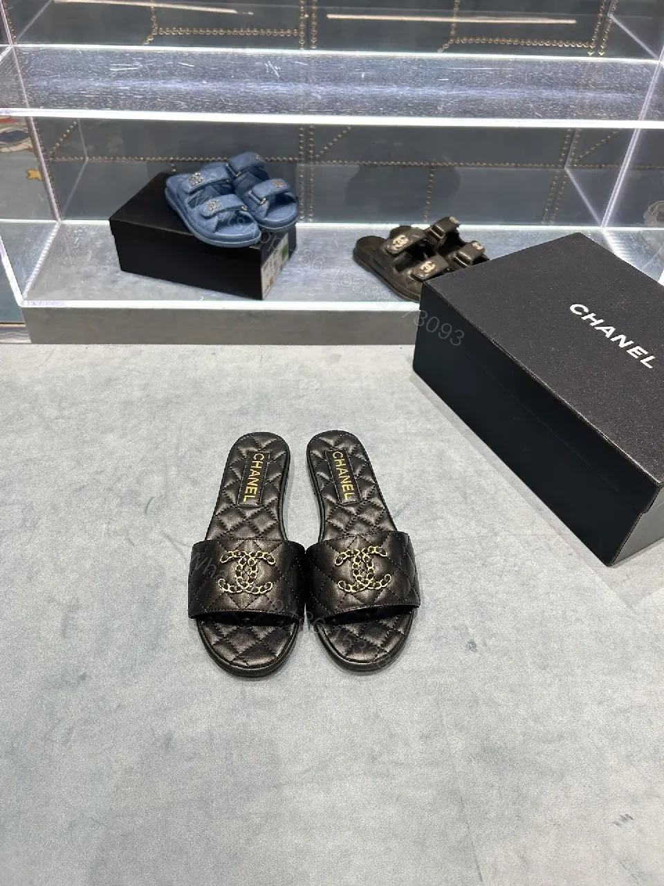 View 3 of Quilted Black Slides with Gold Emblem – Lux Slip-ons