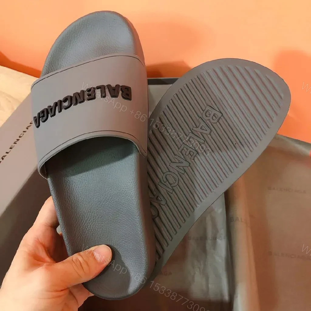 View 4 of Minimalist Designer Slides in Neutral Faux Leather with Bold Logo Strap