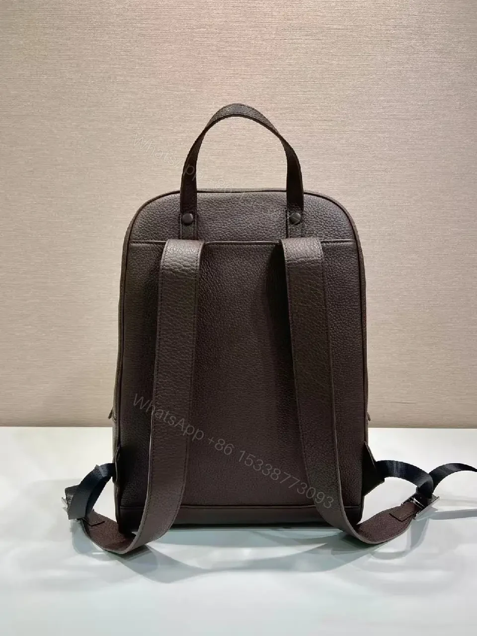 View 10 of Structured Luxury Leather Backpack: Modern Texture, Practical Detailing