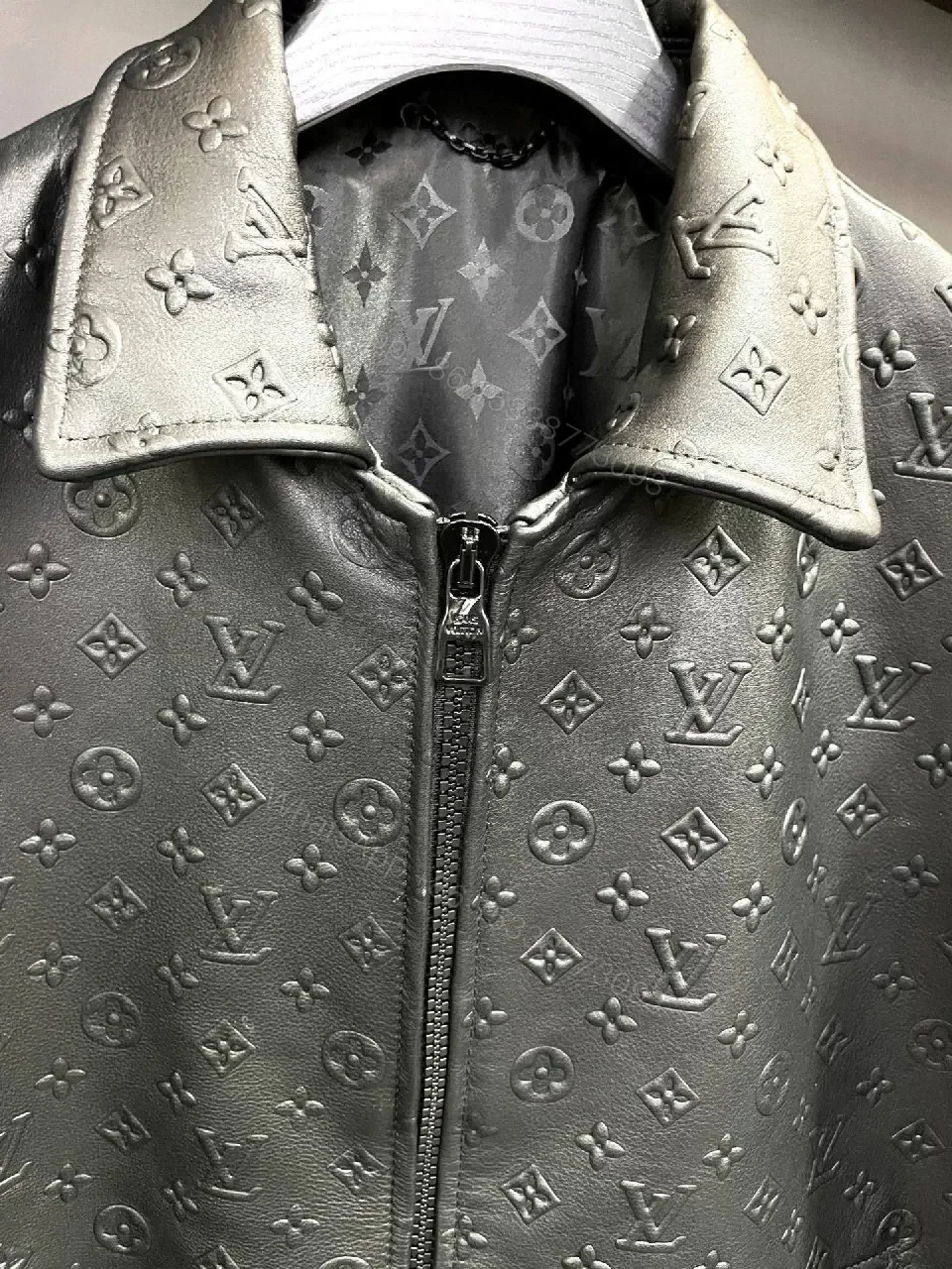 View 9 of Monochrome Leather-Embossed Varsity Jacket: Luxe Texture