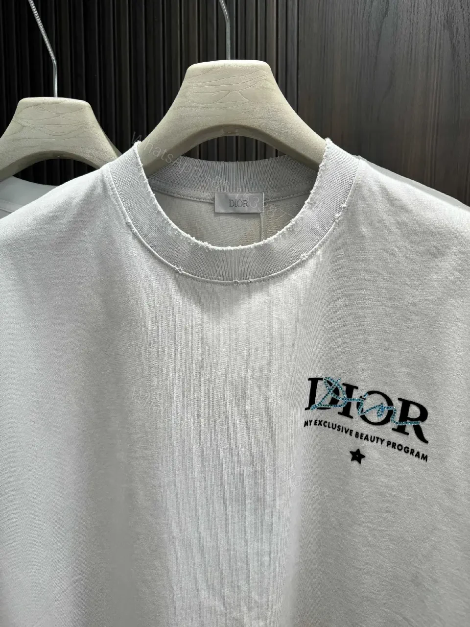 View 4 of Minimalist Logo Tee: Elevated Everyday Comfort, Off-White, Cotton Blend, Relaxed Fit, Short Sleeve Tee
