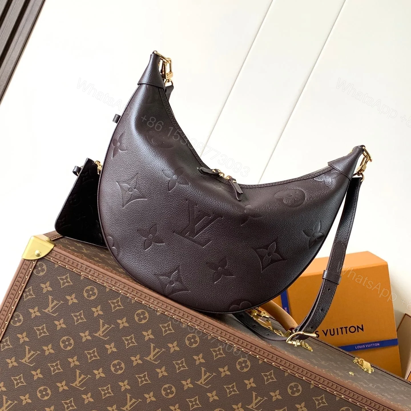 LV LOOP HOBO 38 IN DARK BROWN MONOGRAM CALFSKIN EMBOSSED LOGO — view 1