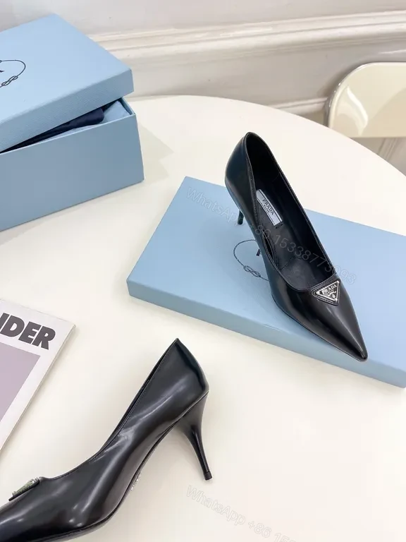 View 3 of Sleek Black Leather Pumps - Prada Hardware Chelsea-Style Pumps