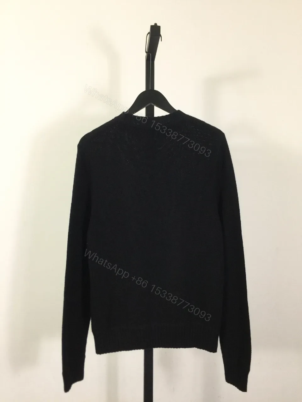 View 5 of Leather-Feel Knit Crewneck with Crest: Subtle Luxury Comfort