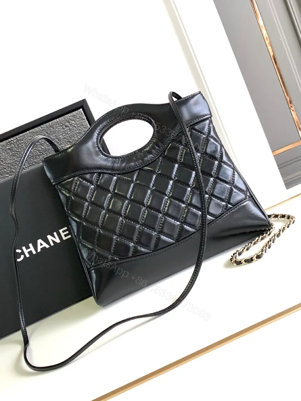 View 9 of Quilted Leather Handbag: Black, Gold Chain, Luxe Everyday Style