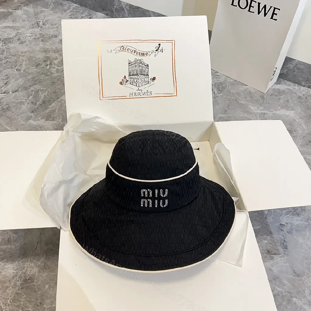 View 8 of Structured Black Straw Bucket Hat — Crystal Logo Accent, All-Season Style