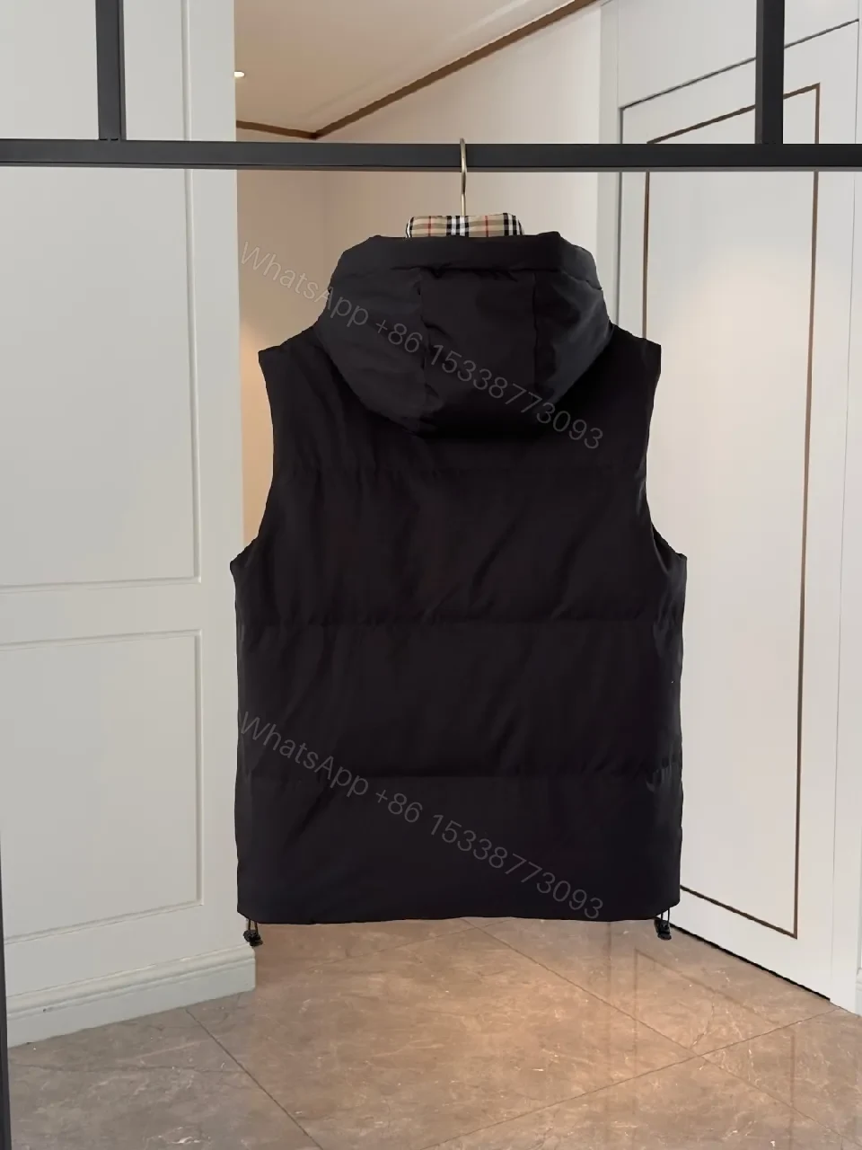 View 6 of Bold Puffer Vest with Plaid Lining — Structured Warmth, Modern Utility