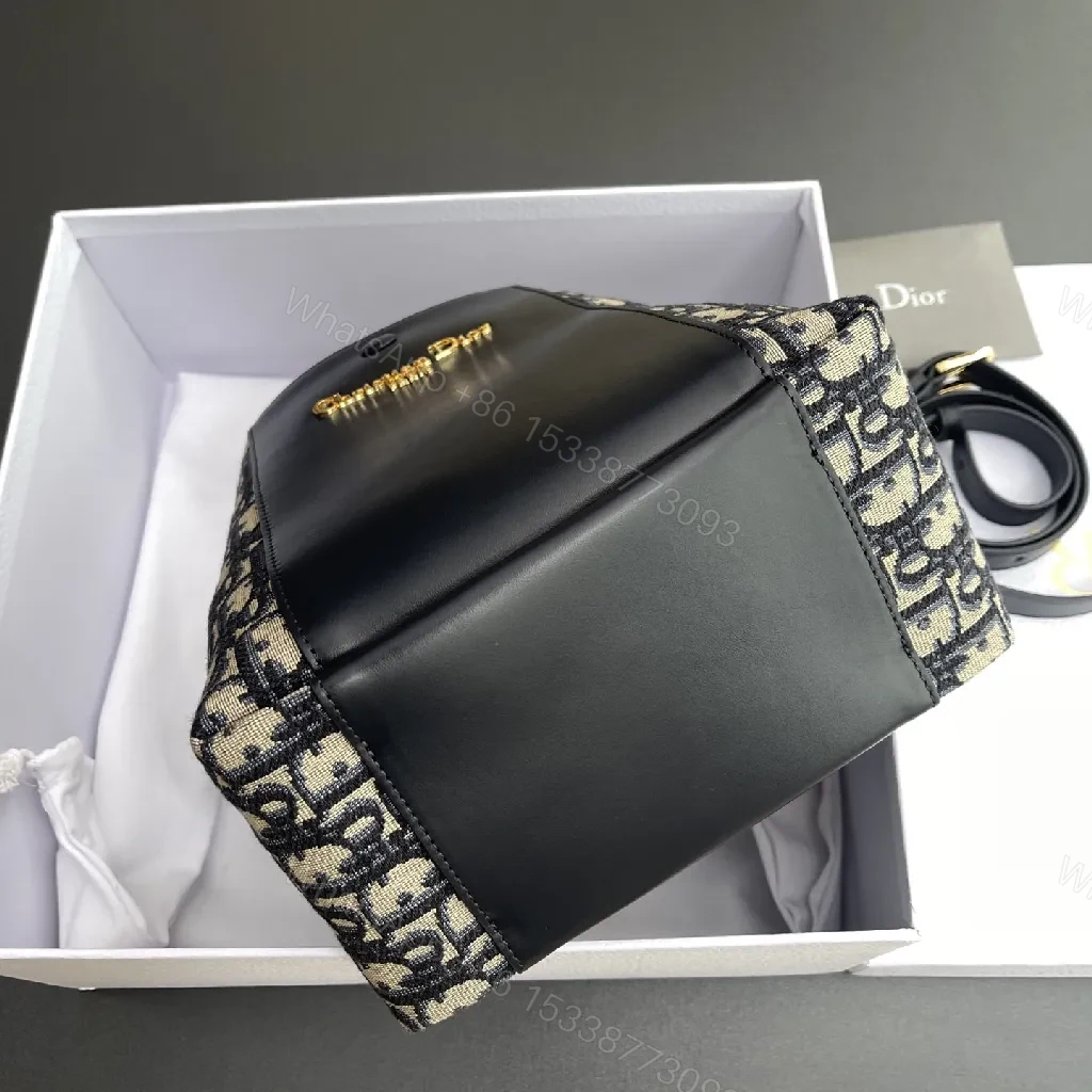 View 3 of Black Leather Mini Crossbody: Signature Monogram Compact Bag