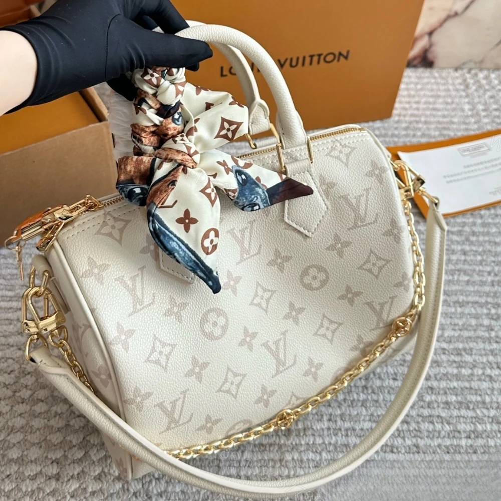View 2 of Louis Vuitton Speedy Bandoulière 25 Cream 25Cm M26690