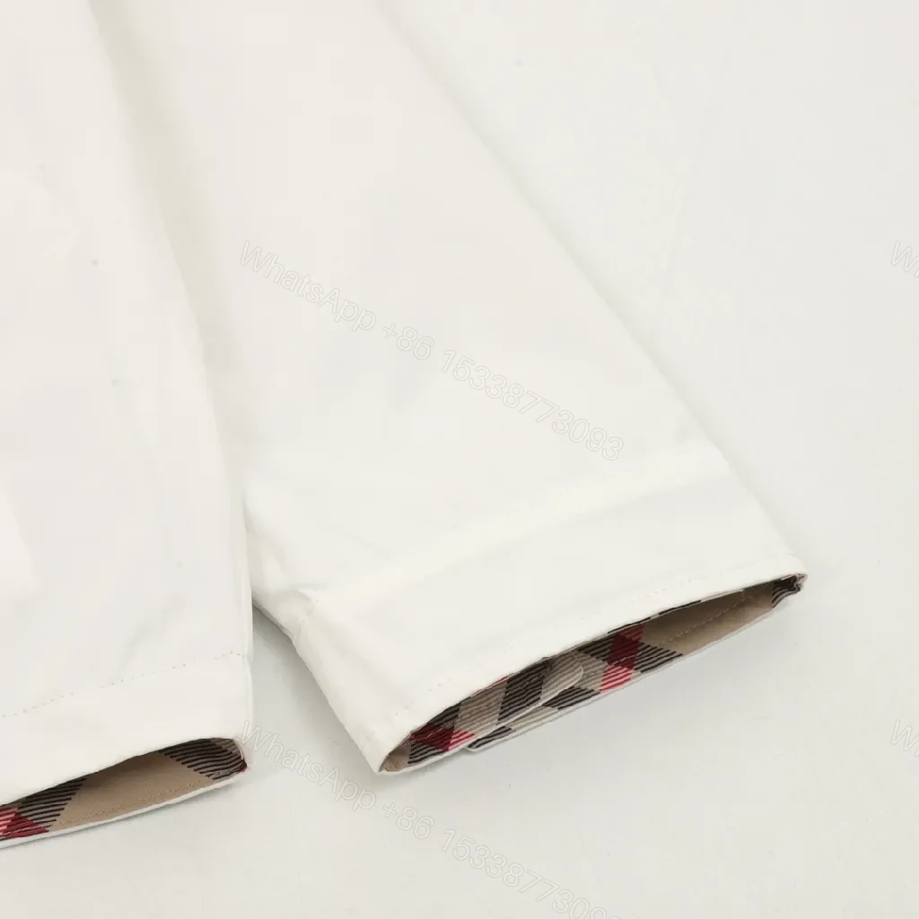 View 12 of Ivory Windbreaker: Minimalist Shell, Check Collar, Versatile Style