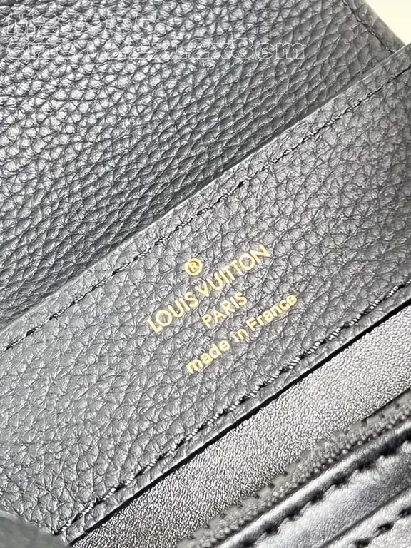 View 5 of Compact Pebble-Leather Crossbody: Monogram-Accent Bag