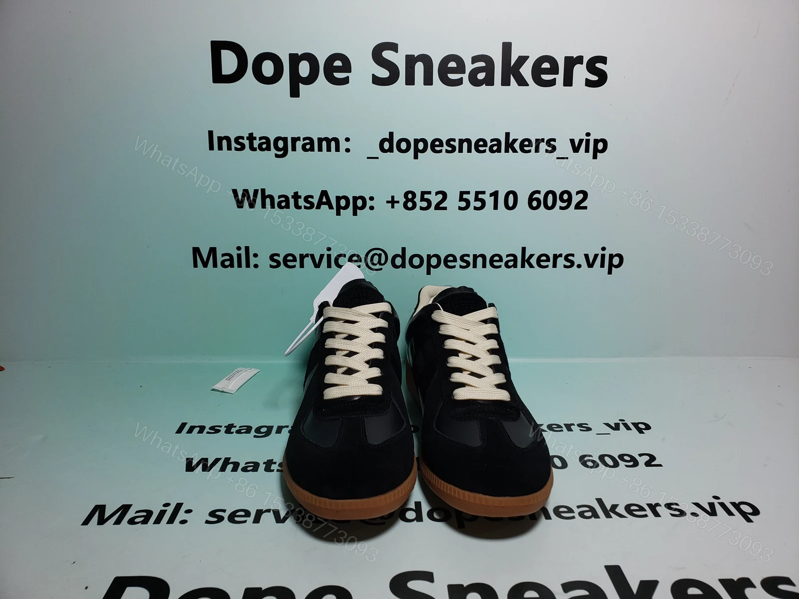 View 4 of Maison Margiela Replica low-top leather sneakers Black S57WS0236P1895