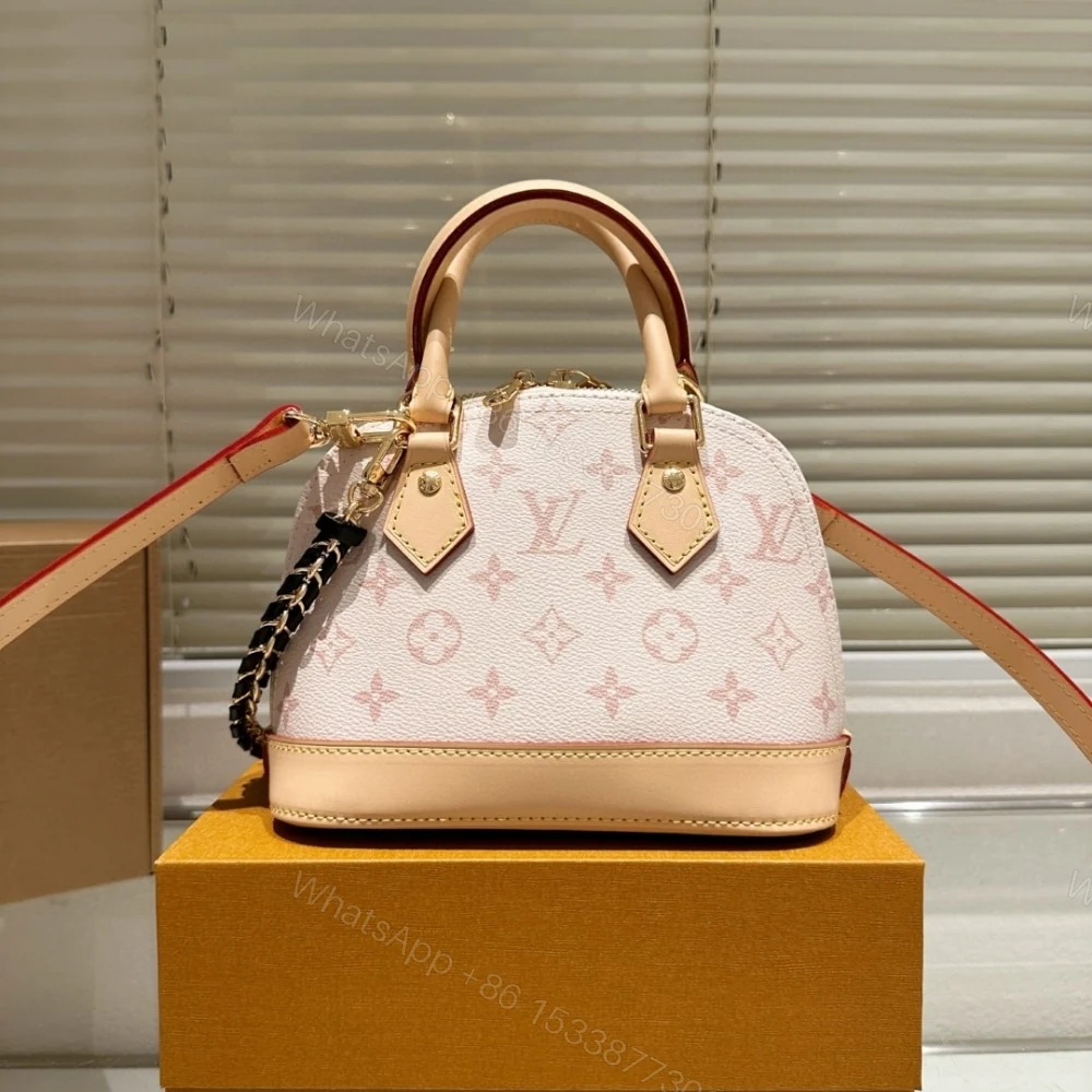 View 3 of Louis Vuitton Alma Mini LV And I Monogram Dune 25Cm K00015