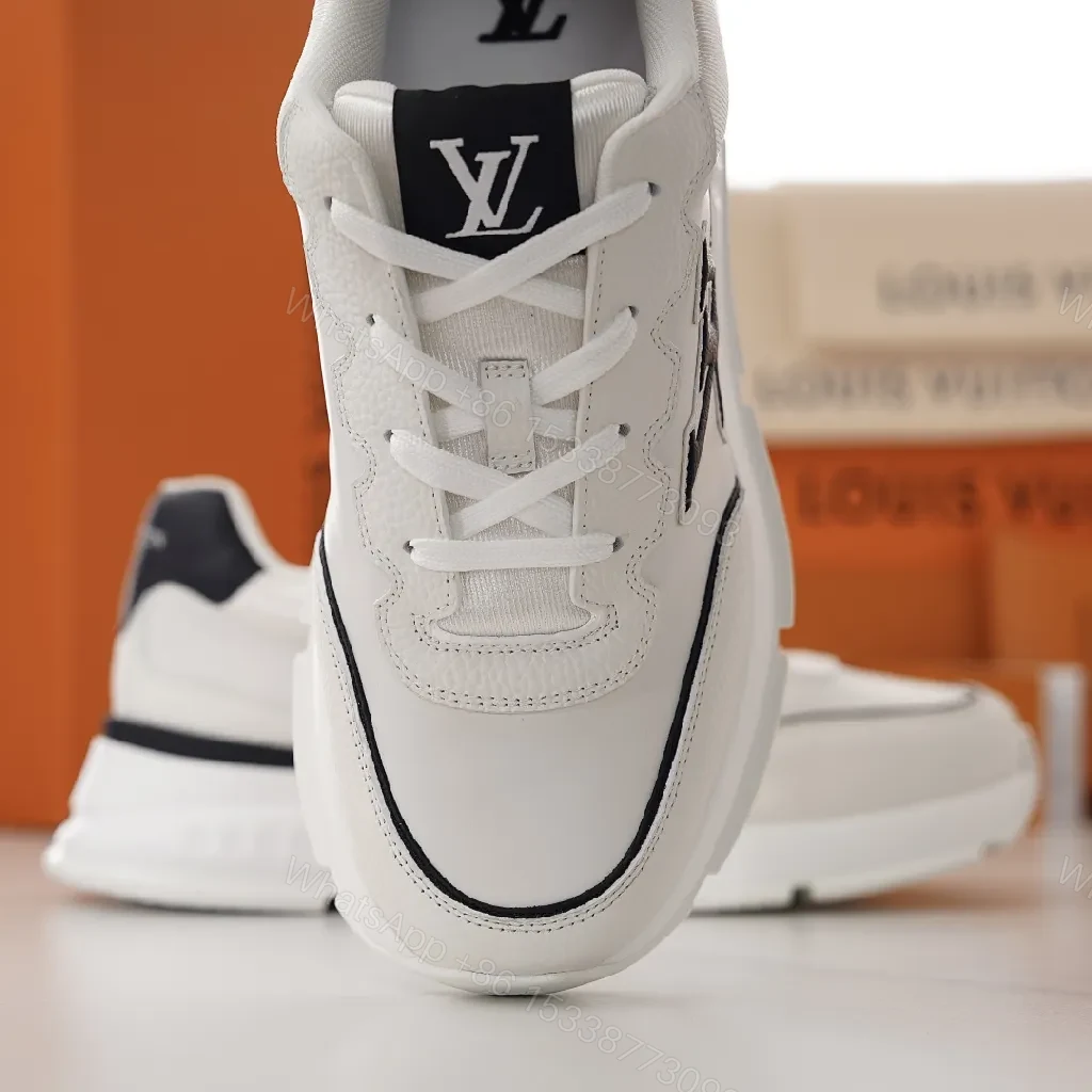 View 2 of White Leather Luxury-Style Sneakers with Monogram Accents