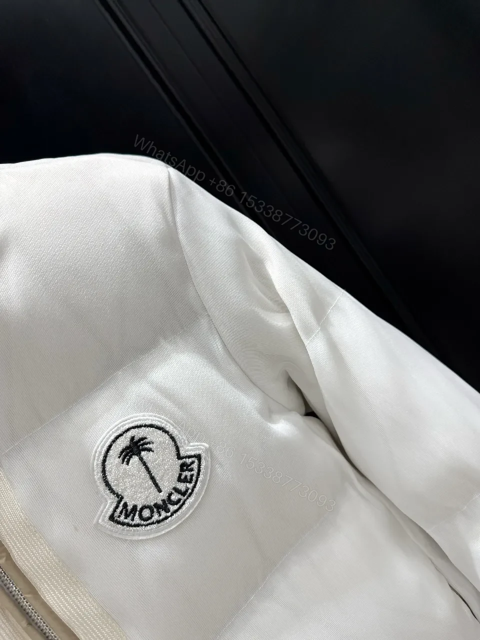 View 4 of White Puffer Jacket with Iconic Emblem, Luxury Everyday Outerwear