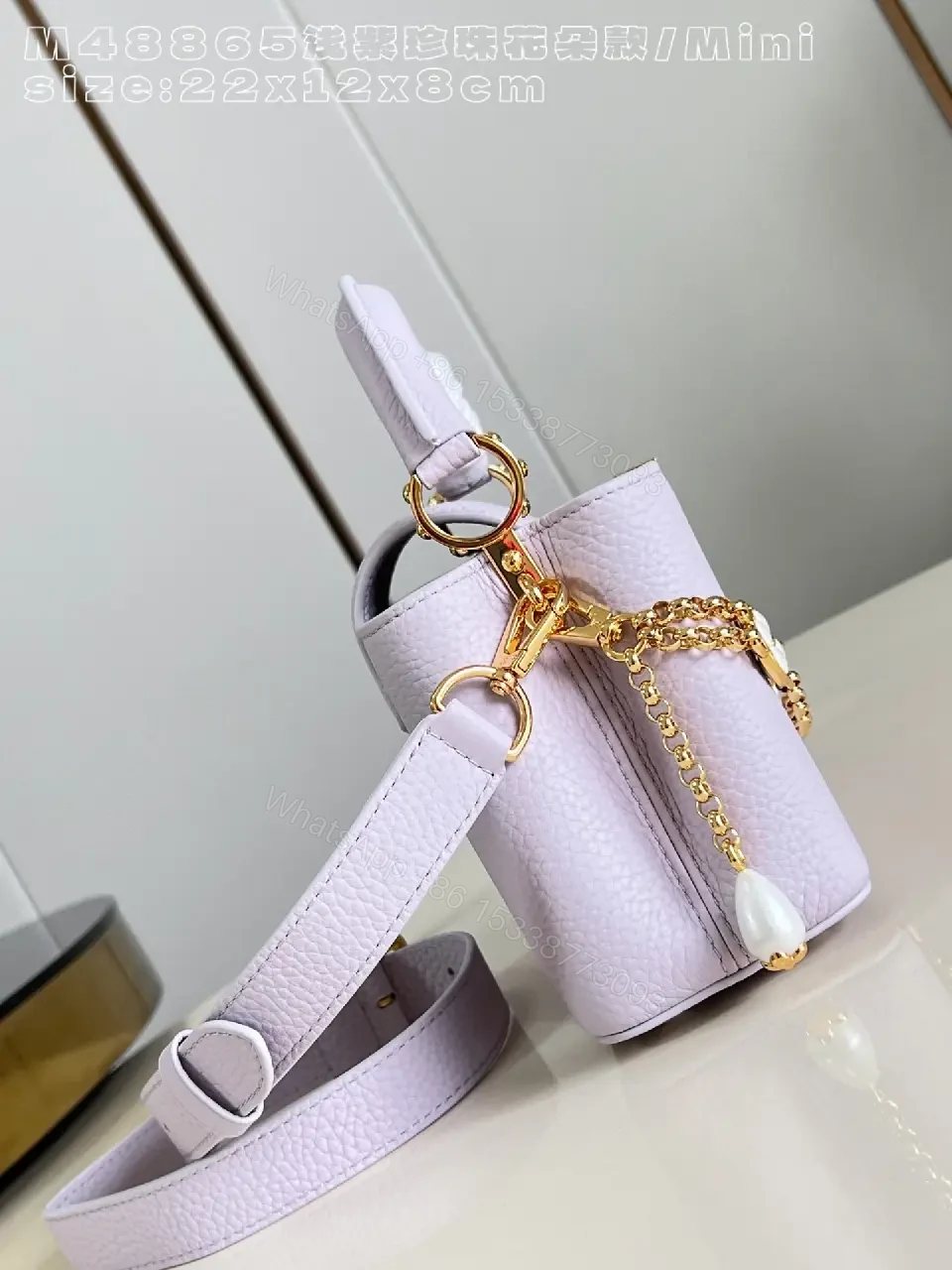 View 3 of Lavender Pebbled Leather Mini Bag – Structured Luxe