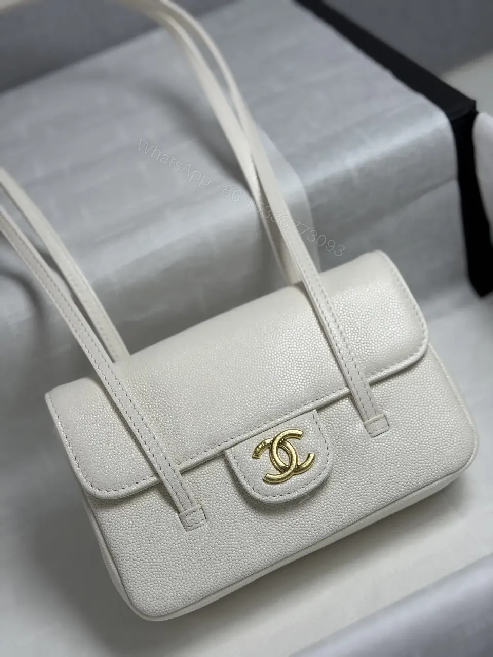 View 4 of Ivory Pebbled Calfskin Satchel: Compact Luxury Bag