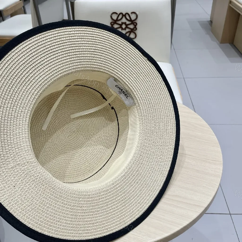 View 3 of Chic Straw Boater Hat with Luxe Band – Everyday Luxury