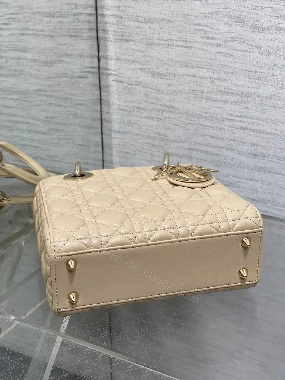 View 8 of Beige Quilted Leather Handbag with Top Handle for Everyday Luxury